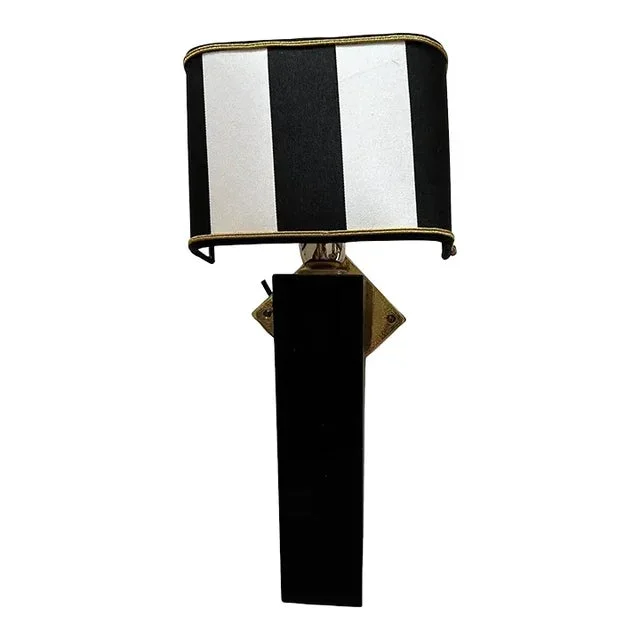 An Elegant 1980s Art Deco Style Black Painted Wood and Brass Italian Wall Sconce