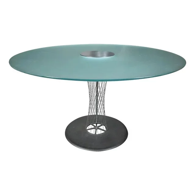 Glass top table by Antonio Citterio