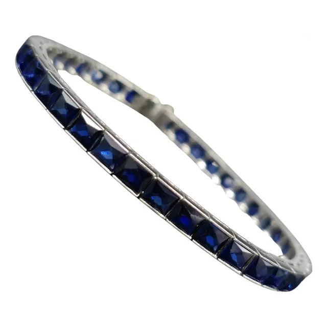 Mid 20th Century Platinum (950) Lab Created Top Quality Sapphire Grench Cut: Tennis Bracelet