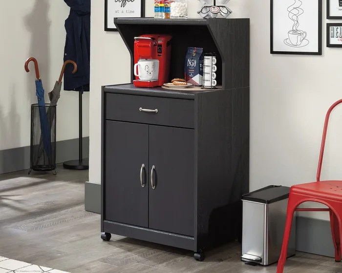 Sauder Select Microwave Kitchen Cart in Raven Oak – Storage Cart with Drawer, Cabinet, Open Shelf & Cord Access for Pantry, Coffee Station, or Appliances