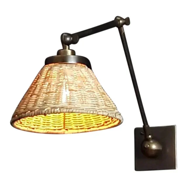 Wick Sconce in Patinated Finish